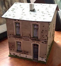 A house of card and photos - Karwansaray Publishers